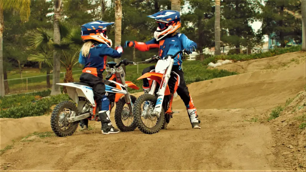 KTM-SX-E5-Kids-electric-motocross-dirt-bike-front-and-rear-view