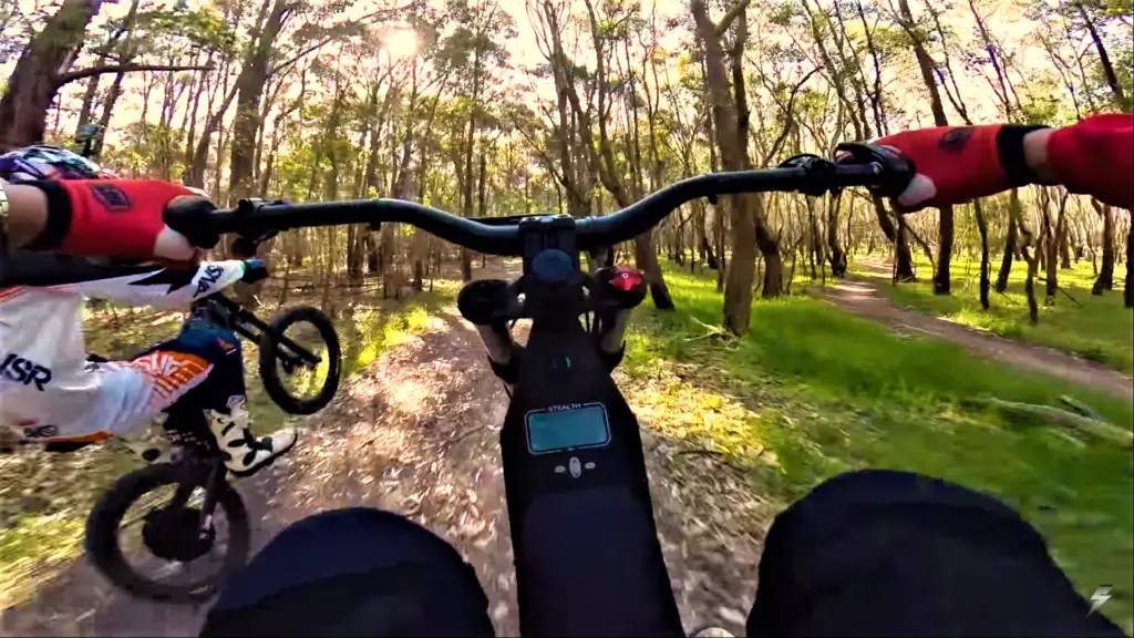 Stealth-H-52-electric-dirt-bike-cockpit-wheelie-shot