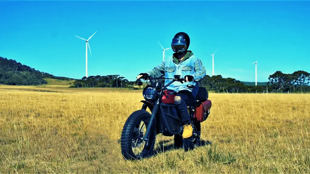 "This slightly frontal shot by Fly Free for the Smart Desert’s promotional video perfectly captures the Smart Desert  Electric scrambler motorcycle."